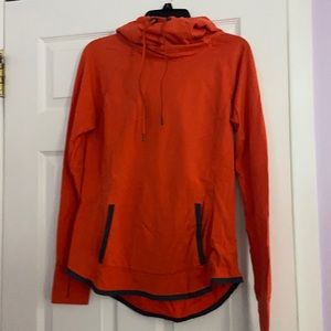 Size Medium Athleta hooded long sleeve dark orange